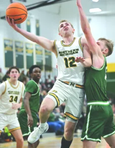 Baptism by fire? Rookie NMU men’s hoops coach Ganz has lots of new faces, early road test